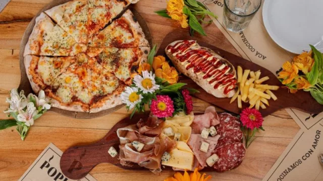 Pizzería Popular presenta su nueva carta: suma entradas, rolls, sándwiches, piadinas, milanesas y hasta panchos en pan de pizza